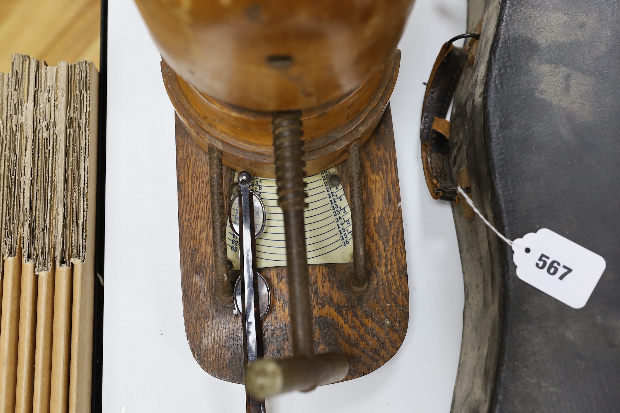 A milliner's hat stretcher and lorgnette